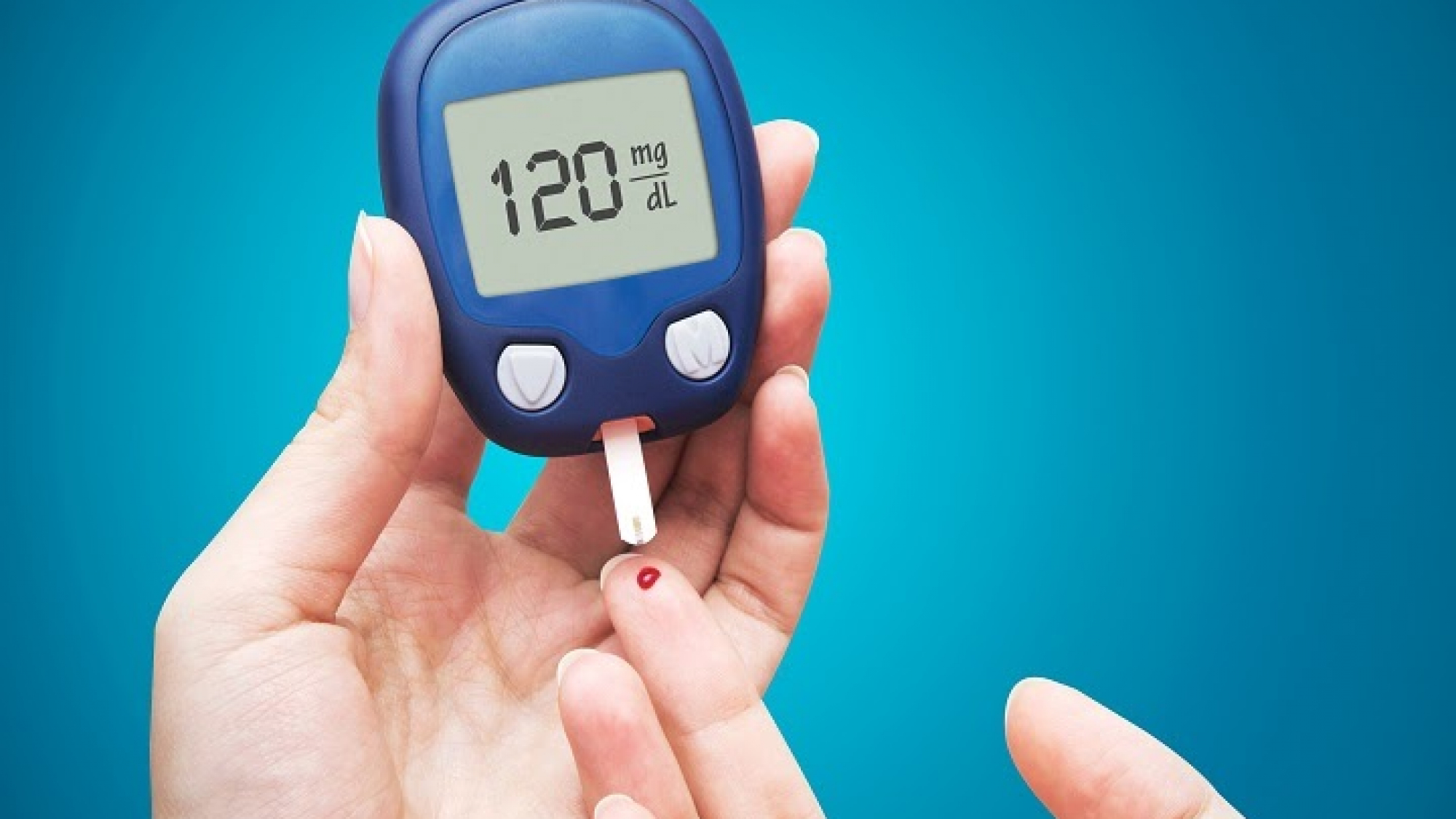 Woman doing blood sugar test